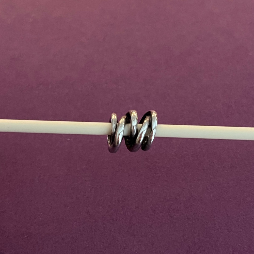 Trollbeads Three Siblings charm. Item # TAGBE-30085.